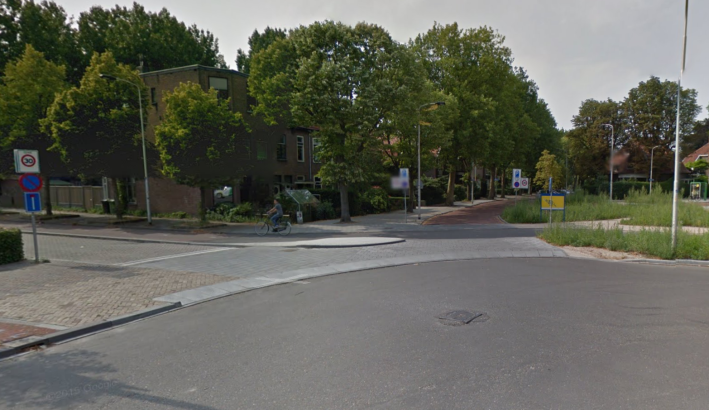 A curved curb in Delft, Netherlands, is an example for what CDOT could build to separate the neighborhood greenway route from the other part of the street.