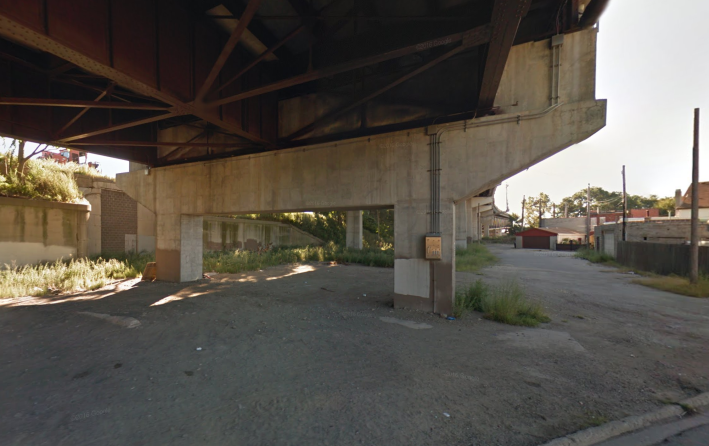 Existing conditions under the skywway at 93rd and Commercial. Image: Google Street View