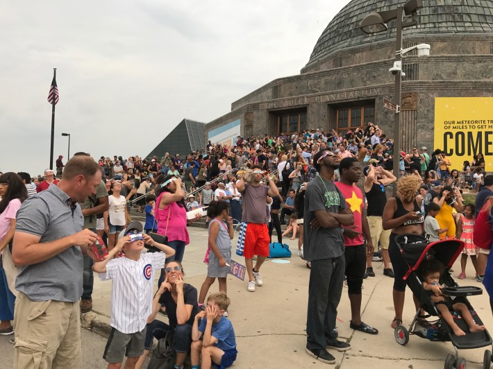 The scene at the planetarium at peak eclipse time, 1:19 p.m. Photo: John Greenfield