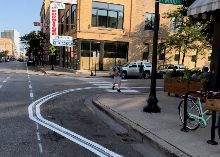 Pretty soon you'll be able to say "Aloha" to new paint-and-post curb extensions at many intersections. Photo: John Greenfield