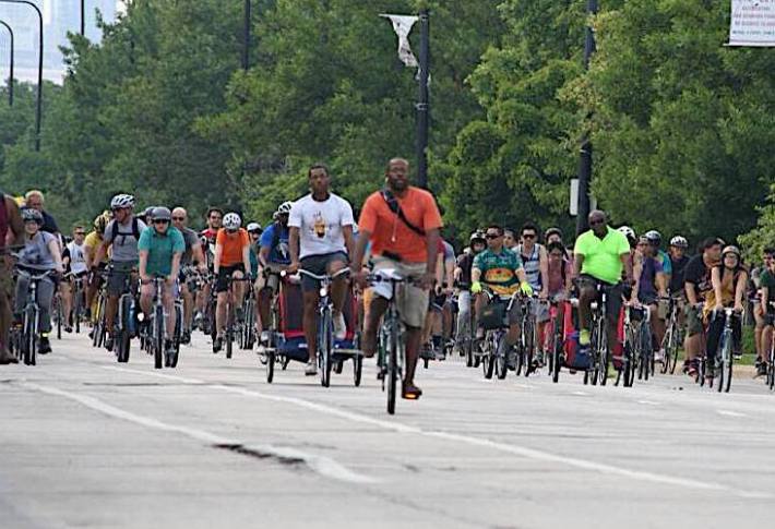 Oboi Reed leads Critical Mass on a tour of the South Side in 2012. Photo: Shawn Conley