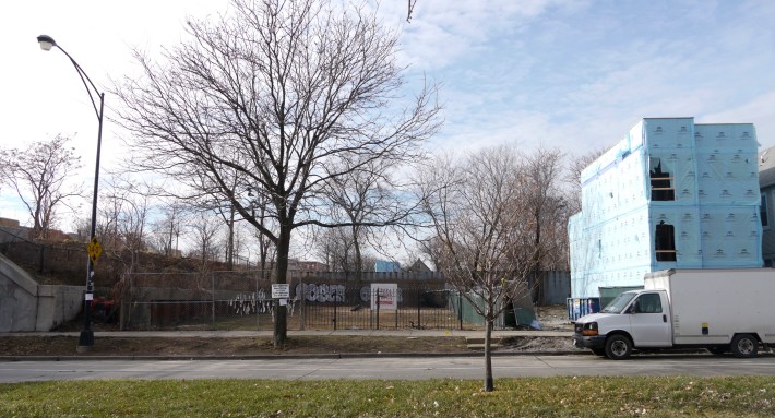 A 3-flat is under construction on 1 of 4 vacant lots. The two closest to the Bloomingdale Trail allow only one single-family house each to be built.