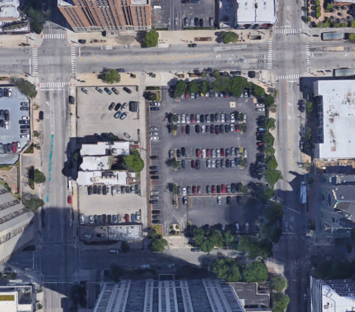 Aerial image of the existing surface lot across from Holy Name Cathedral.
