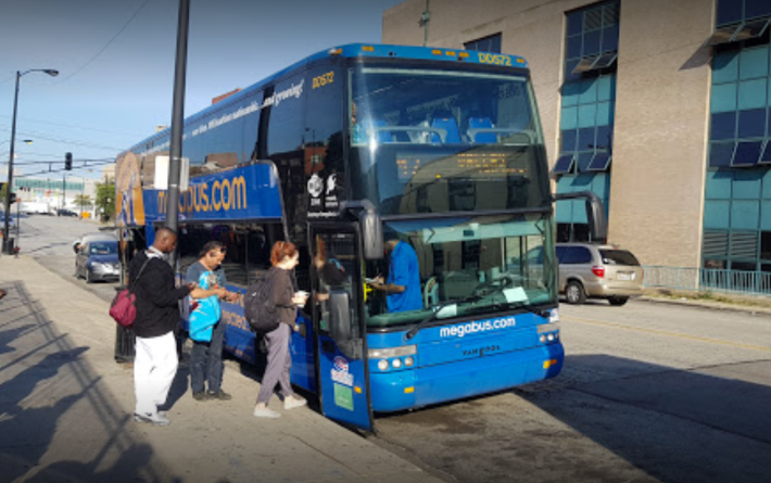 Customers board a Megabus at the new Polk Street pickup location. Photo: Chris Flowers via Google Maps