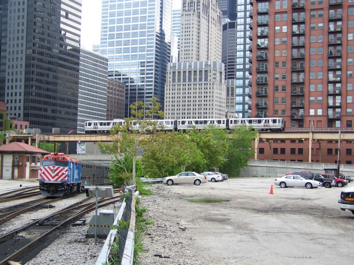 CTA and Metra trains pass like two ships in the night. Photo: Bobby Gragg