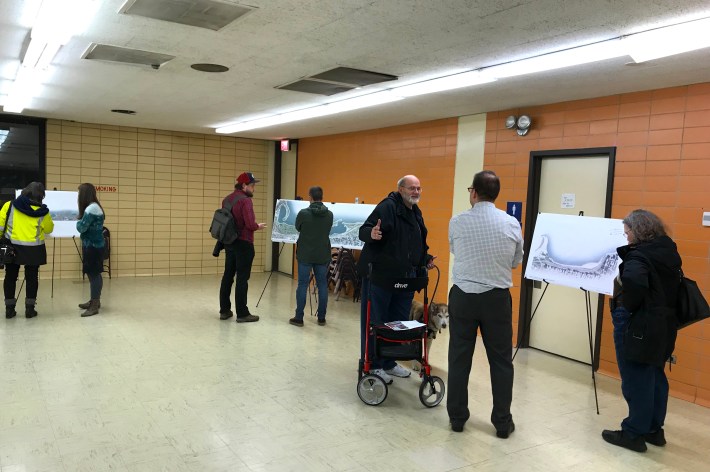 Residents review the plans at Gill Park. Photo: John Greenfield