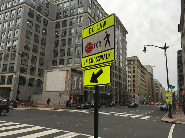 A sidewalk-mounted "Stop for Pedestrians" sign in Washignton, D.C. Photo: Eric Fischer