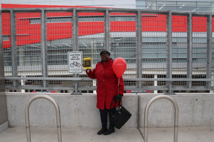 We Keep You Rollin's Deloris Lucas by two of the new bike racks. Photo: Jeff Zoline