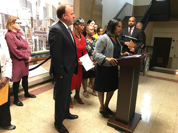 Aldermen Brendan Reilly, Carrie Austin (in red), and Sophhia King (at podium), plus Wells descendent Dan Duster. Photo: John Greenfield