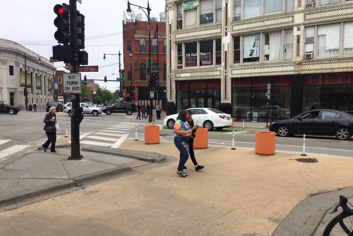 Planters add real protection to the slip lane closure at the southern corner of Milwaukee/North/Damen. Photo: Steven Vance