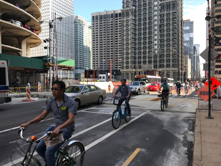 Rush-hour bike traffic crosses the speed bump. Photo: John Greenfield