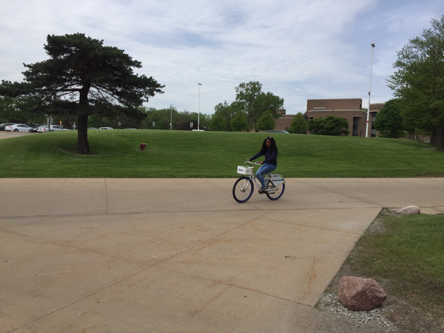 Riding a Pace bike on the Chicago State University campus. Photo: Pace