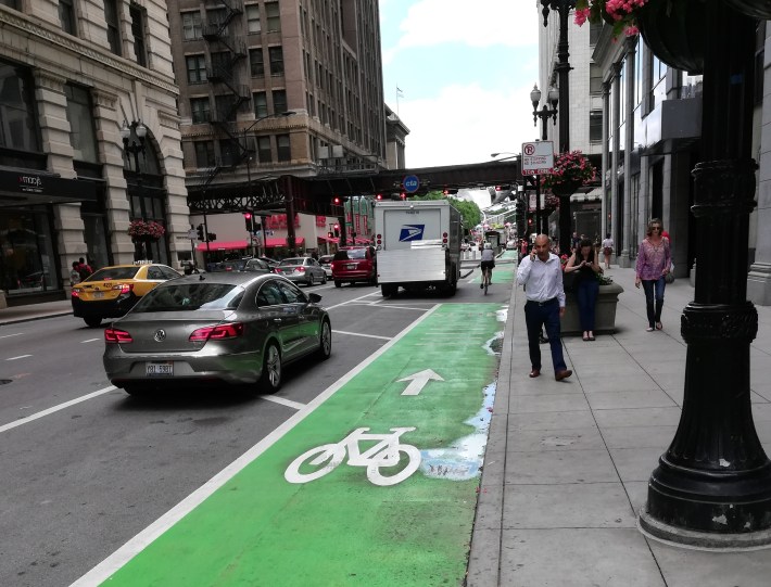 Between State and Wabash, drivers are parking on the buffer but not the bike lane.