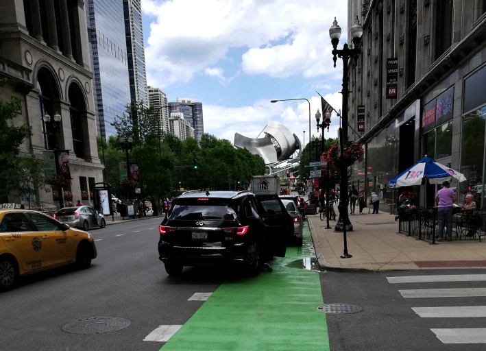 On Washington between Wabash and Michigan, drivers are blocking the bike lane.