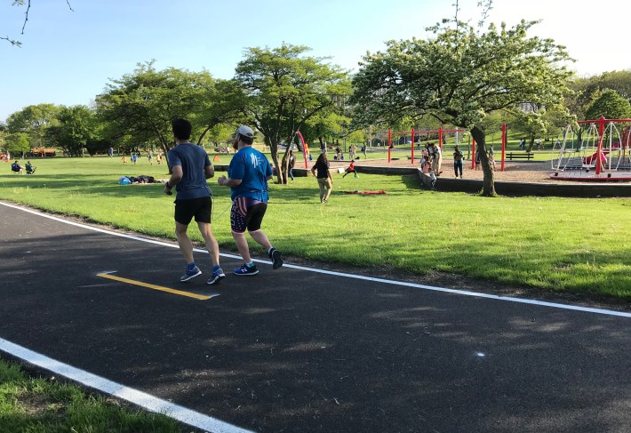 The new trail section runs by a playground north of Lawrence. Does anyone know why these runners are tethered together? Photo: John Greenfield