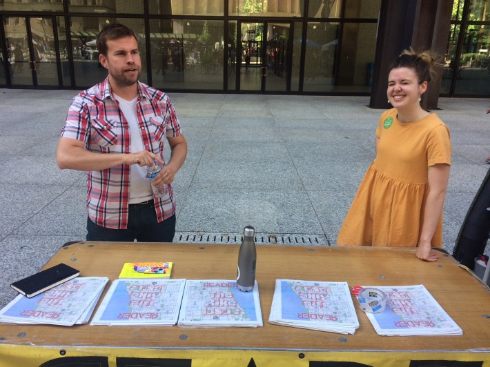 Chicago Reader staff hand out copies of the paper's bike issue, including the Mellow Chicago Bike Map. Photo: James Porter