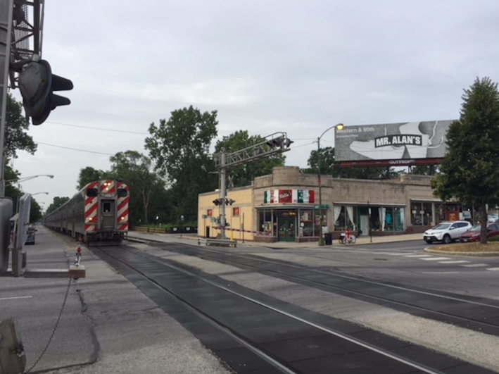 A Metra Rock Island Line train arrives at 95th Street and Wood. Photo: Anne Alt