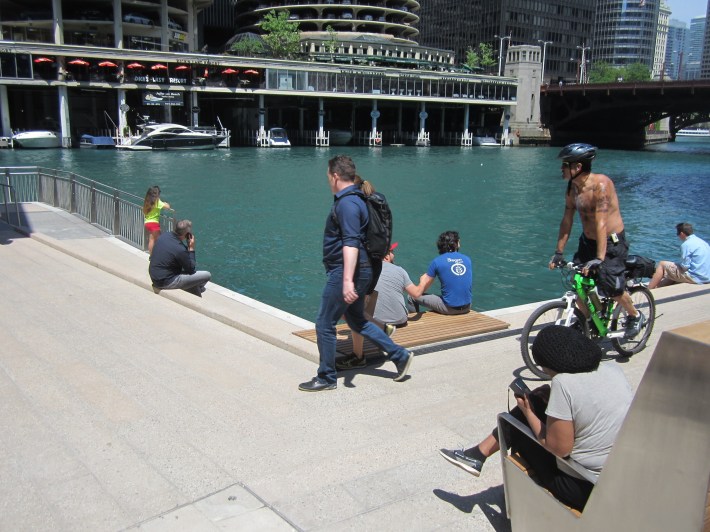 No, you are not being a path hog if you bike on the riverwalk. Photo: John Greenfield