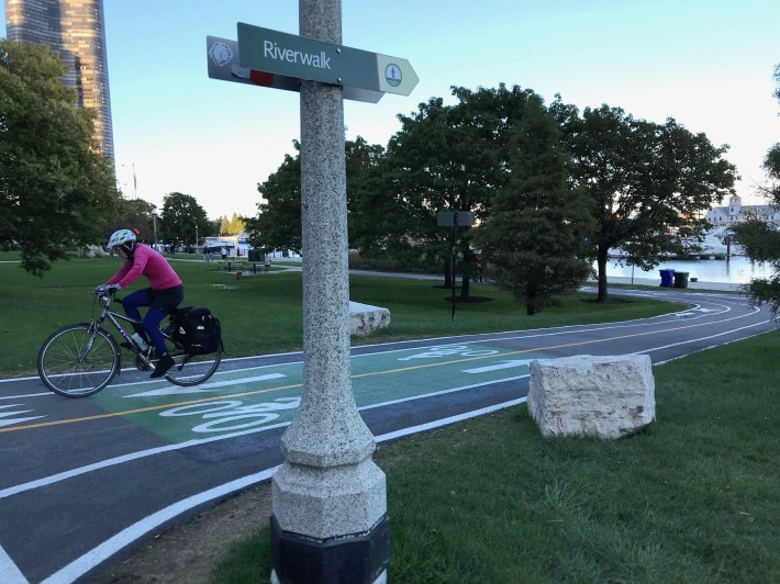 New pavement markings encourage cyclists to bike to the riverwalk. Photo: John Greenfield