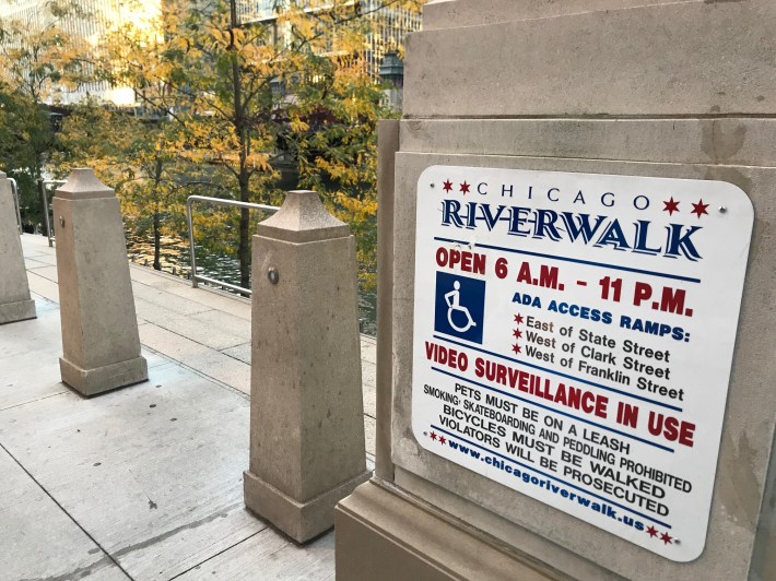 A sign at the Clark Street ramp to the riverwalk. Photo: John Greenfield