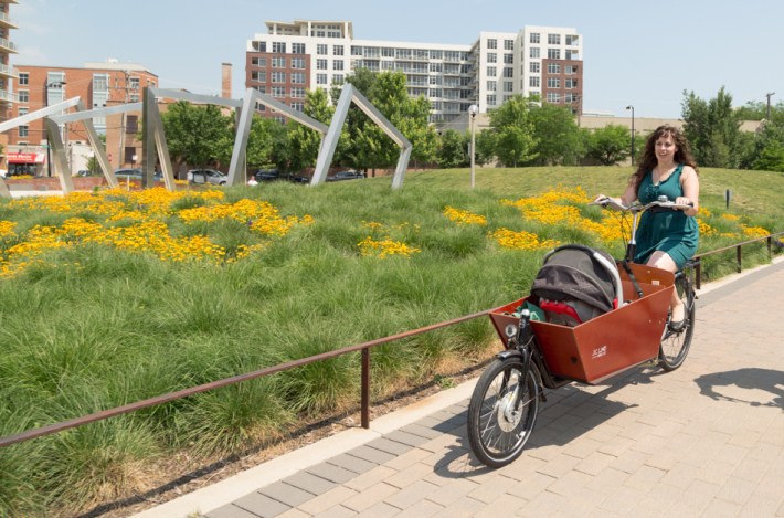 Resman biking with one of her children in Mary Bartelme Park a few years ago. Photo via Resman