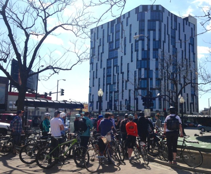 A TOD bike tour led by Steven Vance stops at the 1611 West Division tower. Photo: John Greenfield