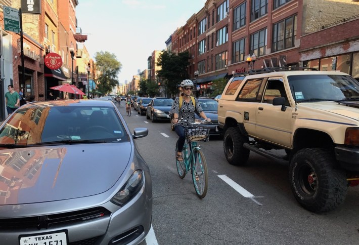The dashed lanes  give cyclists more room to stay away from car doors. Photo: John Greenfield