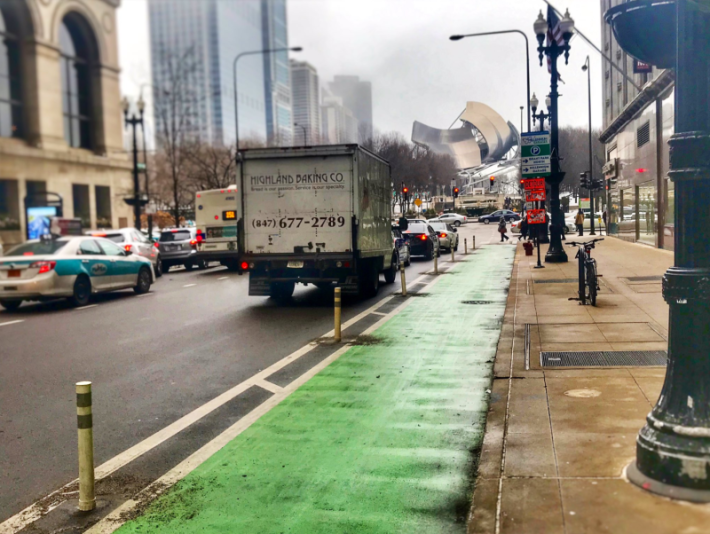 The new posts of the Washington Street bike lane near Michigan Avenue. Photo: Michelle Stenzel