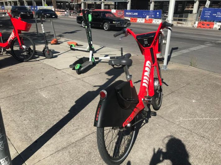 This scooter and dockless bike sidewalk obstruction along South Congress Avenue was the exception to the rule -- the devices were usually parked in a fairly orderly way. Photo: Lynda Lopez