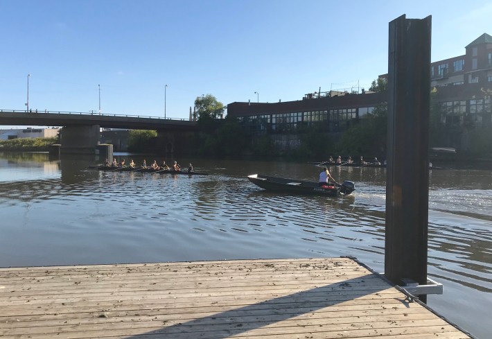 A crew team passes by the new dock. Photo: John Greenfield