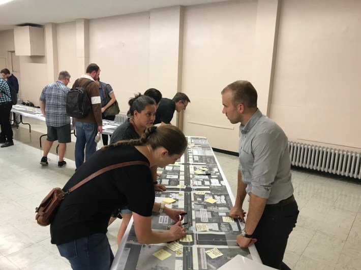 Residents leave Post-It notes with comments on a printout of the Leland corridor. Photo: John Greenfield