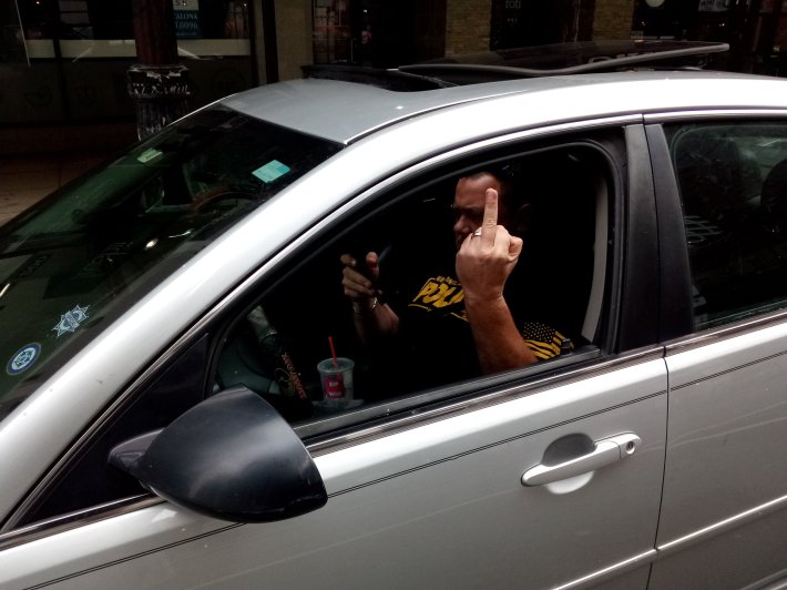 An undercover officer parked in a bike lane. Photo via Bike Lane Uprising.