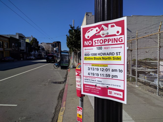 Immediately after cyclist Tess Rothstein was fatally struck in San Francisco, SFMTA's Rapid Response team put up "no stopping" signs on Howard and bagged the parking meters. Photo: Roger Ruddick, Streetsblog San Francsico