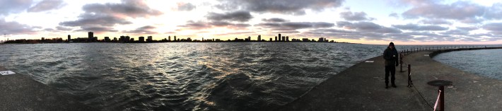 Sunset from the pier at Montrose Beach. A socially-distanced walk on the lakefront is a great way to safely spend time with a friend or relative you don't live with. Photo: John Greenfield