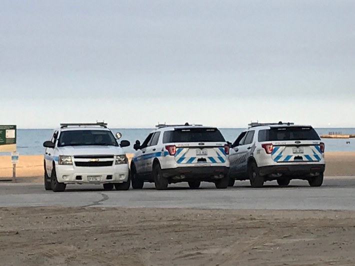 Police officers parked at North Avenue Beach a couple weeks ago. Photo: John Greenfield