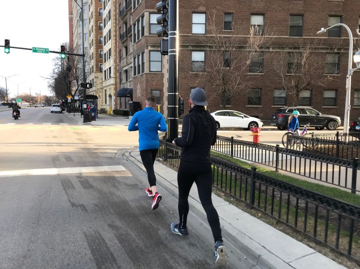 Some people chose to run in the street on Inner Lake Shore Drive so as to avoid crowds. Photo: John Greenfield