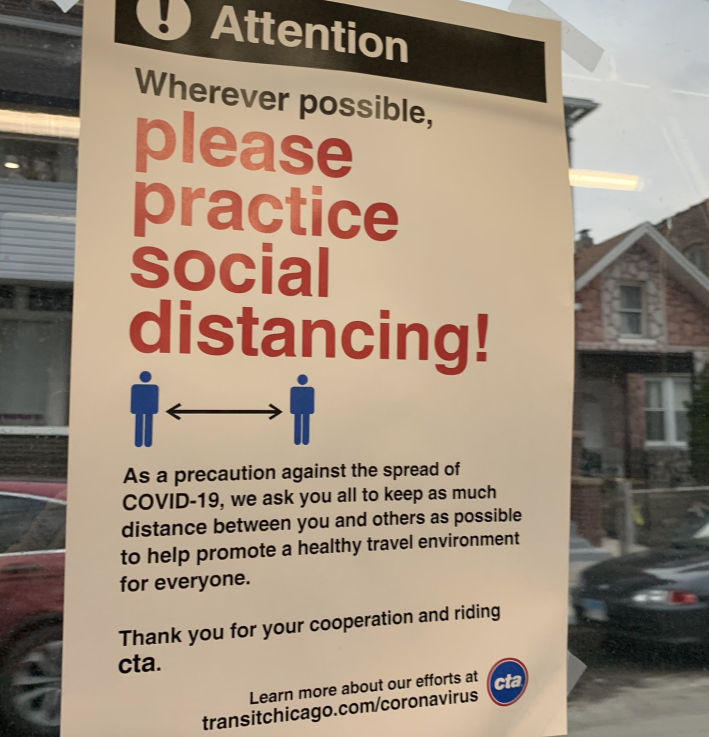 A sign encouraging social distancing in a CTA bus. Photo: City of Chicago