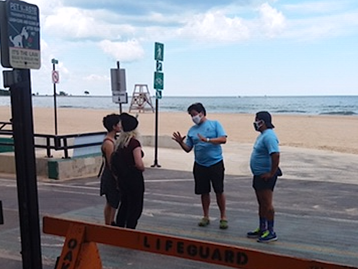 Social Distancing Ambassadors at Oak Street Beach. this part of the Lakefront Trail is currently closed. Photo: Chicago Park District