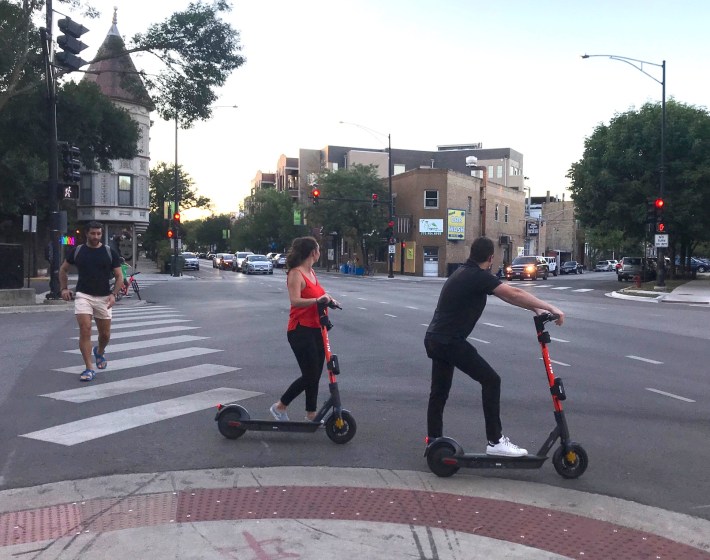 Riding scooters in Lakeview. Photo: John Greenfield