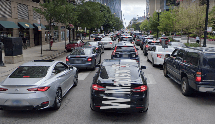 Single-occupant car drivers creating a traffic jam on Madison Street. Image: Google Maps