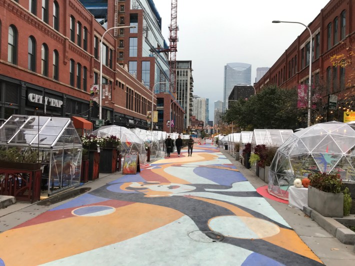 Greenhouses and domes on the pedestrianized block of Fulton Market.