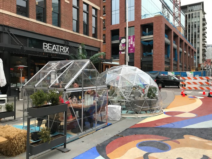 Private outdoor dining enclosures on the pedestrianized block of Fulton Market. Photo: John Greenfield