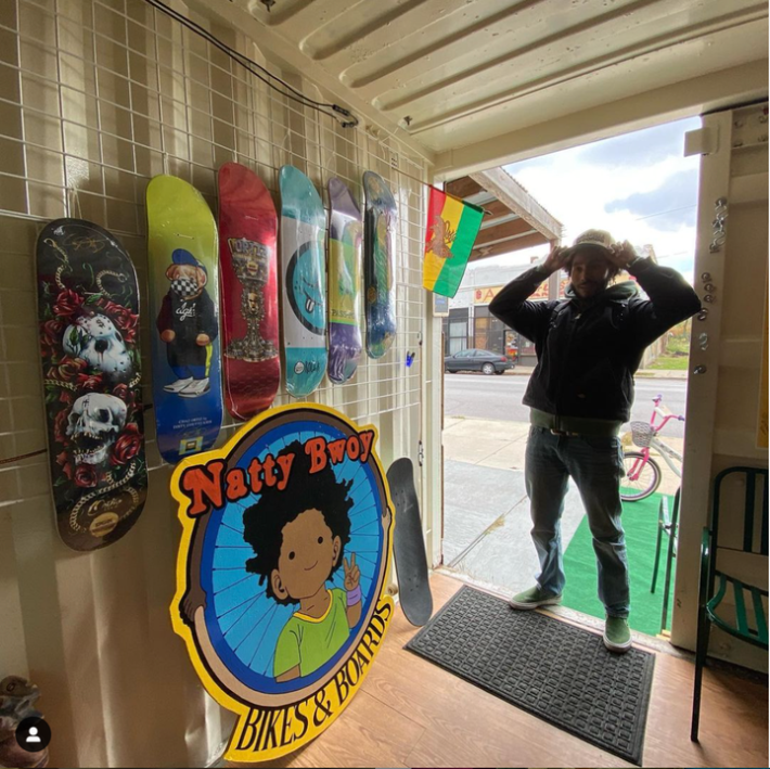 Kahari Blackburn standing in the Natty Bwoy Bikes & Board space when it was housed in the shipping container in Boxville.