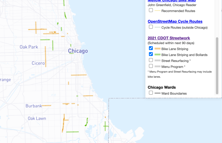 Screenshot of the Chicago Bike Routes map with the 2021 Bike Lane Striping (green) and 2021 Bike Lane Striping With Bollards (brown) layers clicked on. Image: Paul Esling