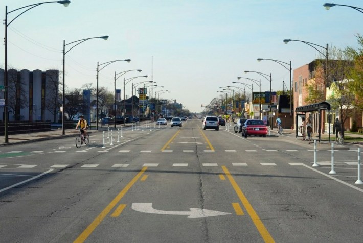 Proposed layout of Milwaukee Avenue with protected bike lanes, north of the Jefferson Park Transit Center. Image: CDOT