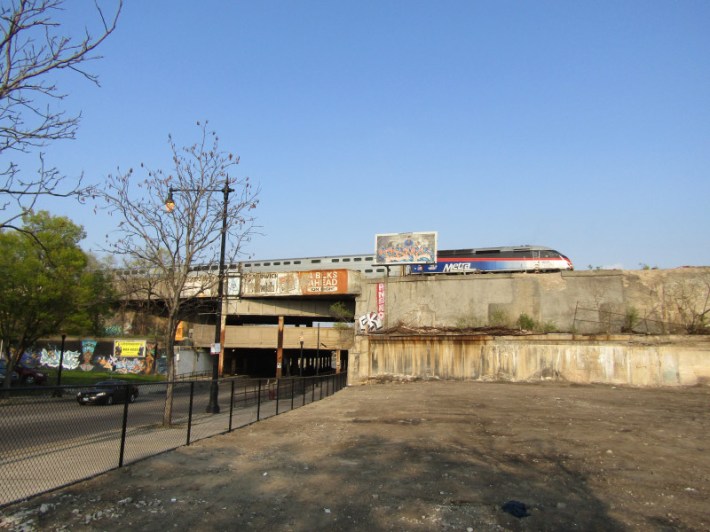 An inbound Rock Island District train rides over the 79th Street bridge, past the site of the future Auburn Park station (foreground.) Photo: Igor Studenkov