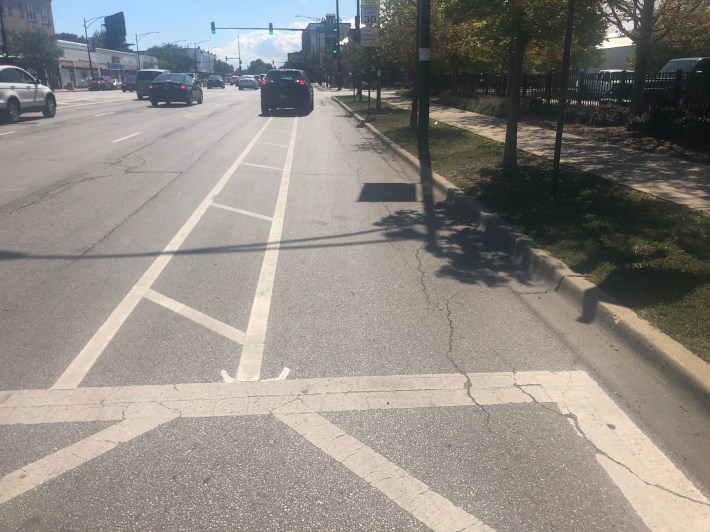 View from the "bike lane" headed South on Clark approaching Elmdale. A few drivers entered "the bike lane" to turn right.