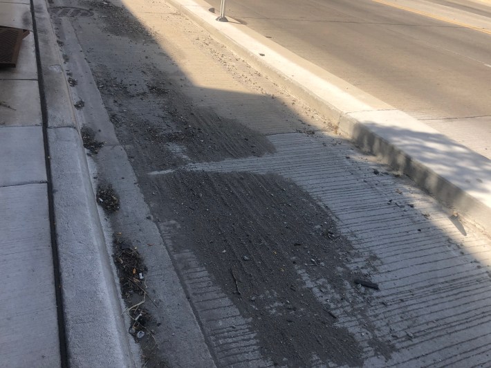 Gravel runoff in the Elston bike lane.Photo: Courtney Cobbs