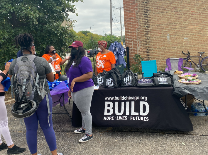 BUILD gave out backpacks and water bottles at the event. Photo: James Porter