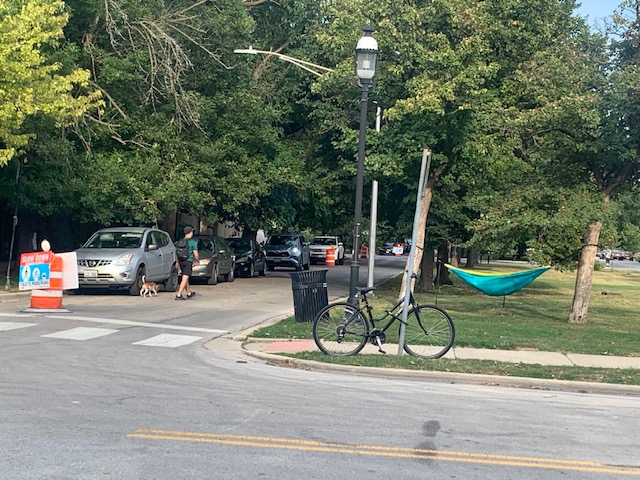 Slow Street + bike + hammock = a relaxing situation on Logan Boulevard. Photo: Sharon Hoyer